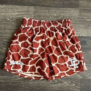 Inaka power shorts, size medium, giraffe pattern
